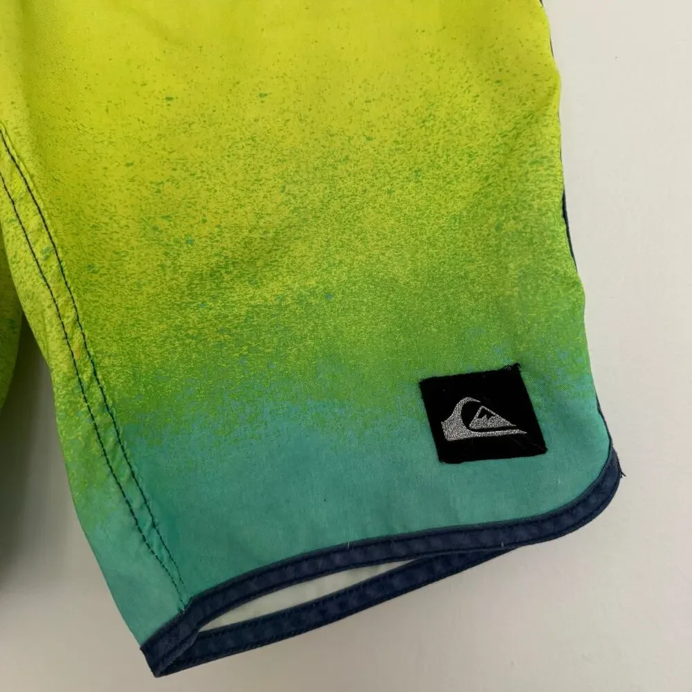 Quiksilver Board Shorts Featuring a Checkerboard Top and a Gradient Bottom